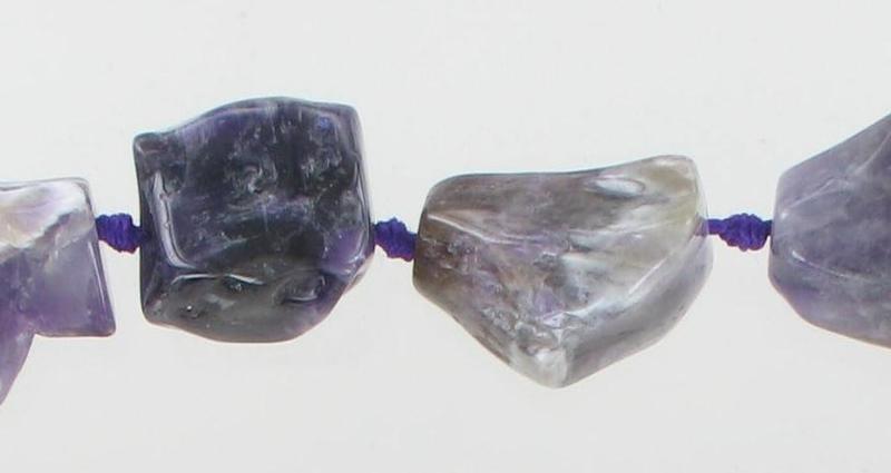 1027544 Dog Teeth Amethyst Nugget